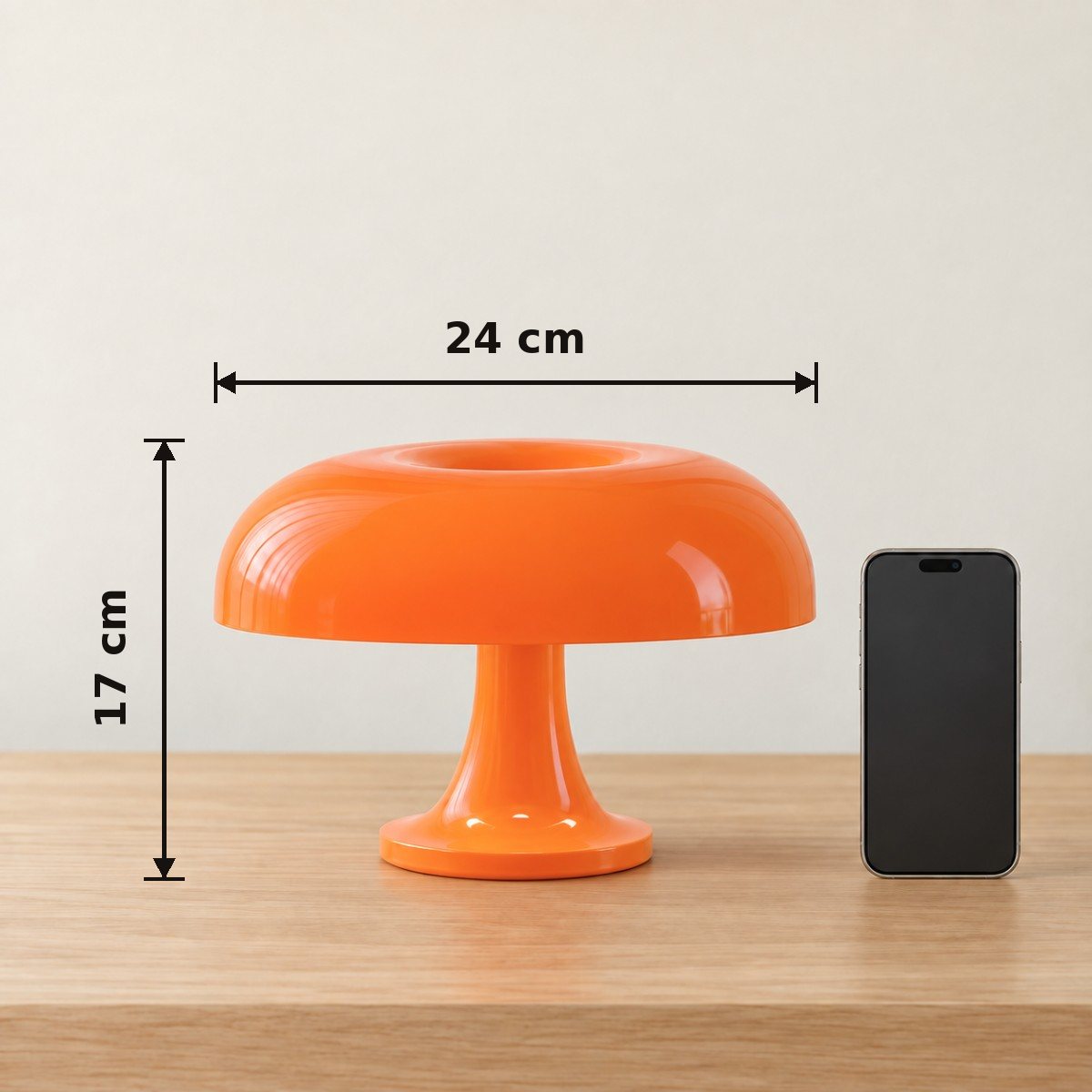 Medidas de la lámpara hongo Granidea: 24 cm de ancho y 17 cm de alto, al lado de un celular